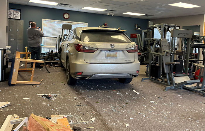 Car crashed into office building